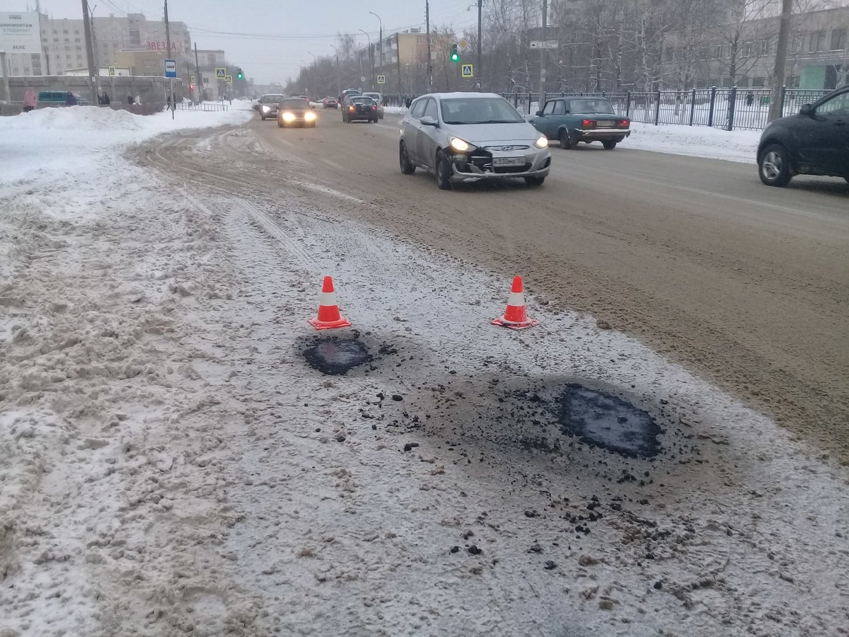 Власти Дзержинска объяснили проведение ямочного ремонта в снег - фото 1